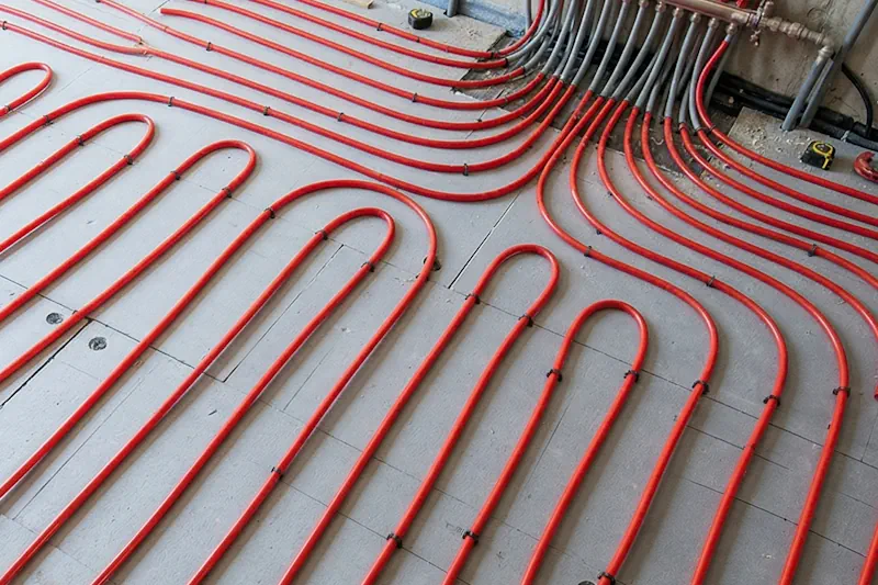 Pipe in screed underfloor heating installation