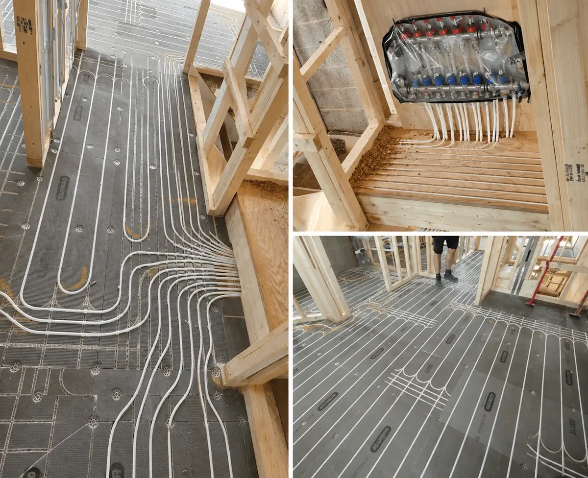 White underfloor heating pipes routed through 20mm grooved cementitious insulation boards around timber stud partitioning